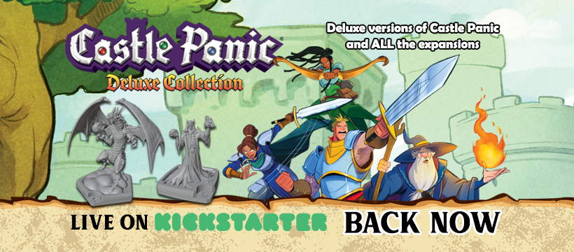 A group of heroes stand before the castle. Plastic minis from the deluxe game nearby.